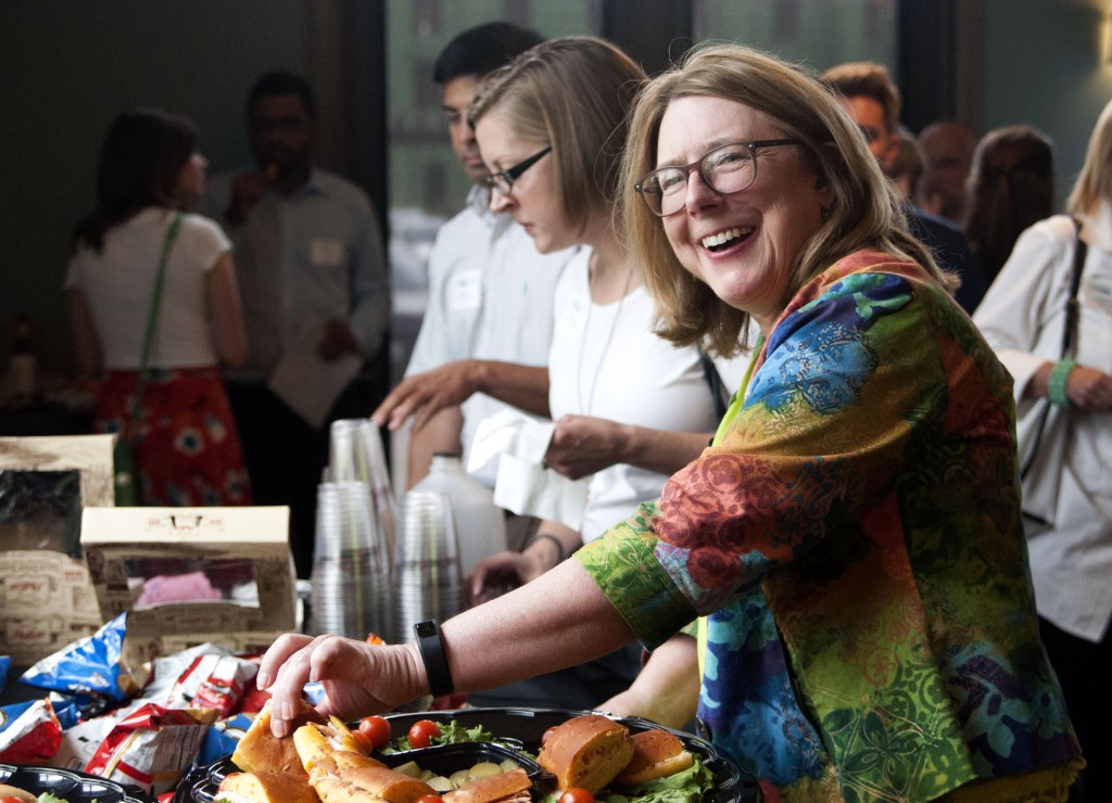 Laurie Shook enjoys delicious treats from food sponsor Collin Street Bakery