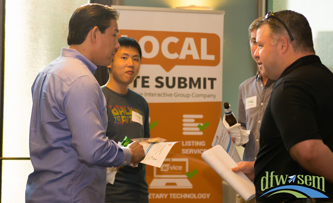 Attendees network after the meeting over cold beer and warm pizza.