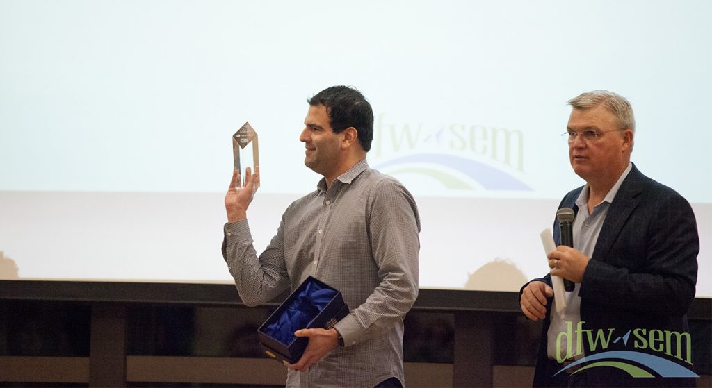 James Loomstein shows off his DFWSEM President's Award trophy.